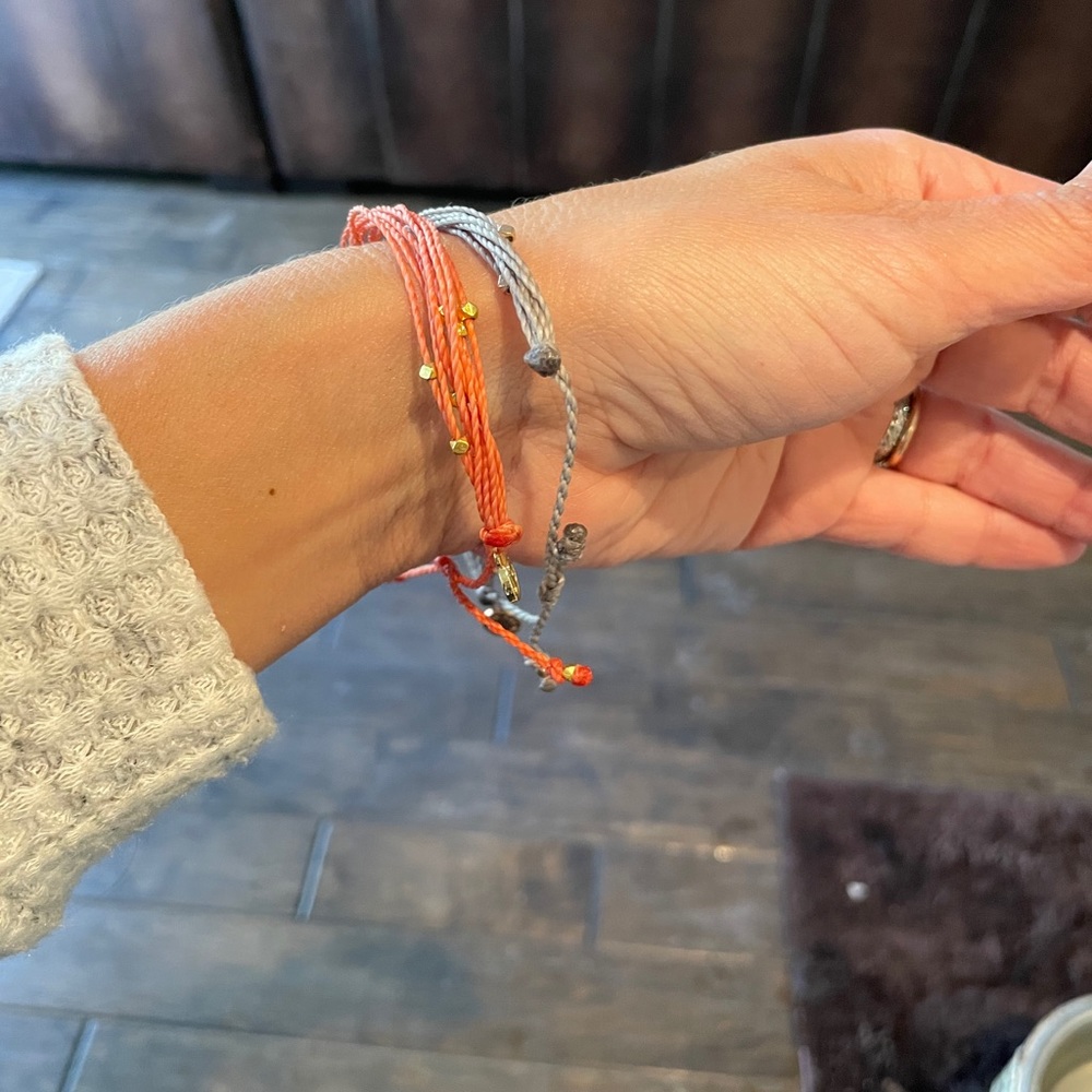 Puravida bracelets one peach and one gray